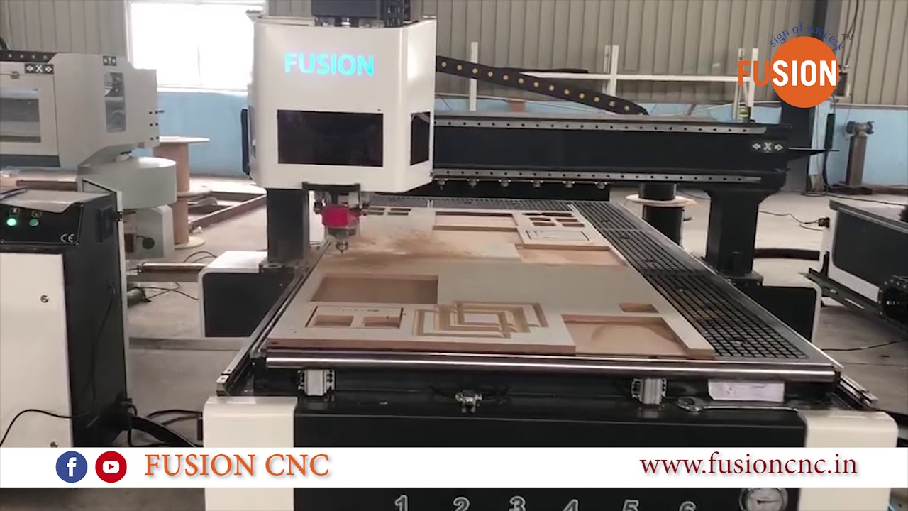 ATC CNC router machine routing a wood panel